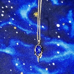 Natural star sapphire set in sterling silver necklace.